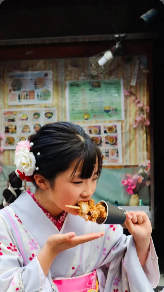 Street food in a kimono in Japan