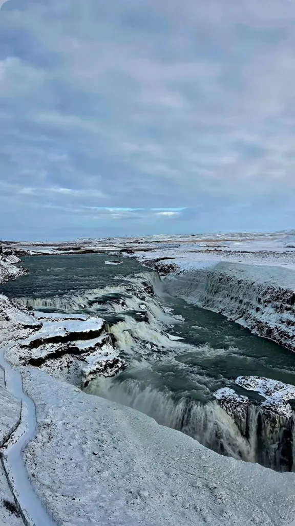 Gullfoss with snow on its banks